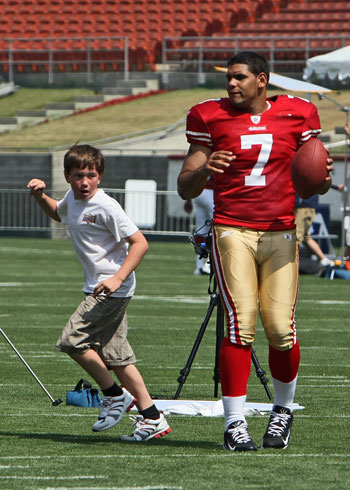 Nate Davis & Kyle Tolle (waterboy) playing catch.