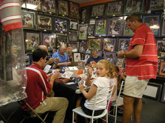 Collectors enjoying Upper Deck’s 2009 MLB Goodwin Champions set at a recent promotional night