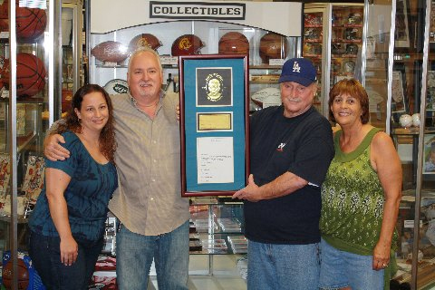 The Bono family won a Jackie Robinson authenticated autograph piece this year at South Bay Baseball Cards.
