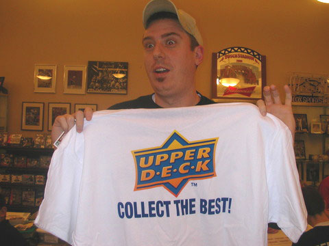 One of Fox Sports Cards customers showing off an Upper Deck shirt he won at a trade night.