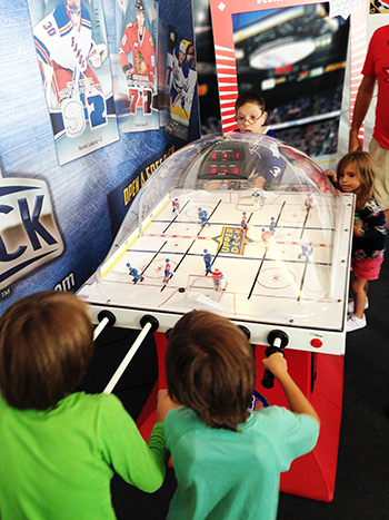 2016-upper-deck-tim-hortons-world-cup-hockey-nhl-fan-village-kids-playing-bubble-hockey