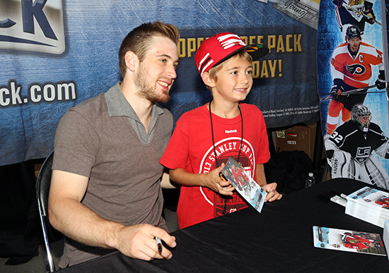 2017-nhl-draft-upper-deck-booth-autograph-session-tyler-motte-chicago-blackhawks-trade-panarin-columbus-happy-kid