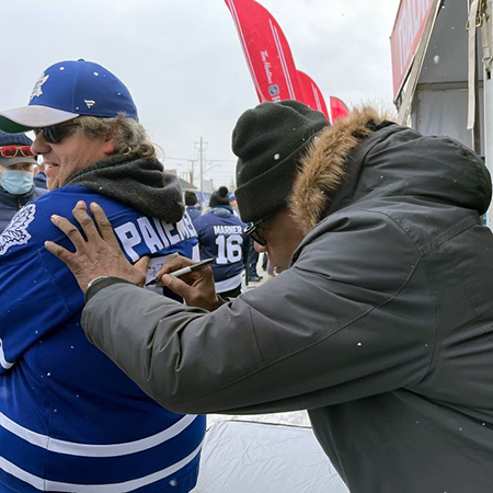 valmore james autograph signing african-american nhl hockey player upper deck booth heritage classic